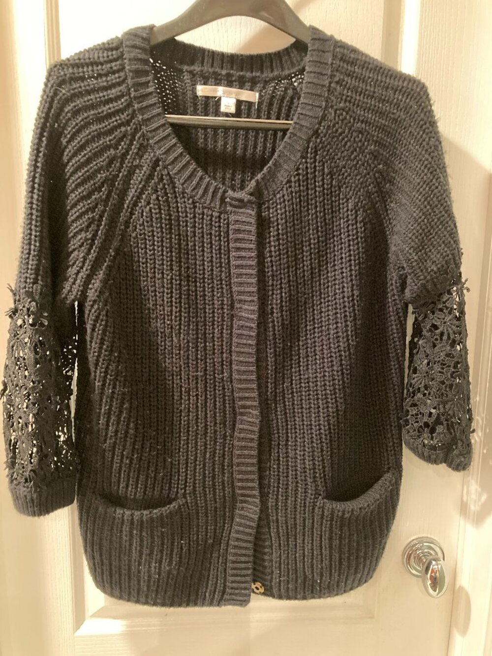 Very uniqure back sweater with fancy lace sleeves.